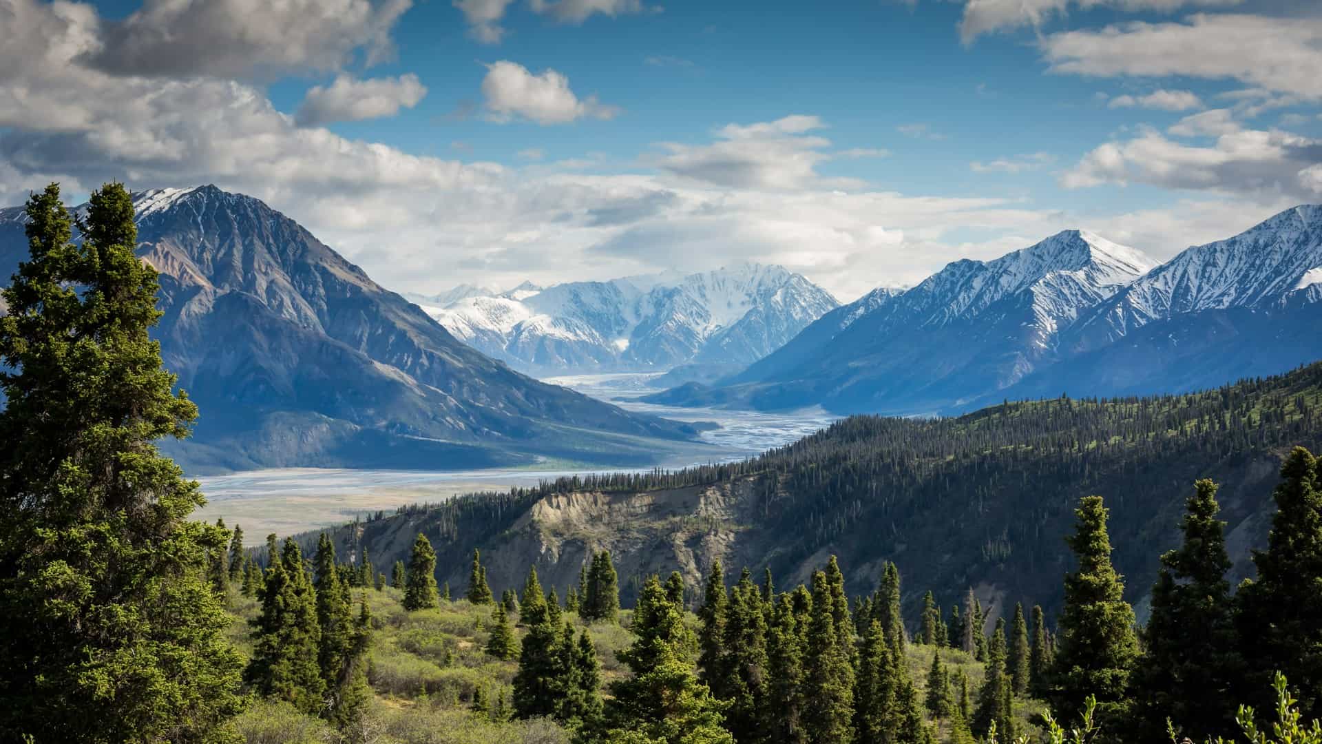 Panoramic view of mountain peaks at golden hour
